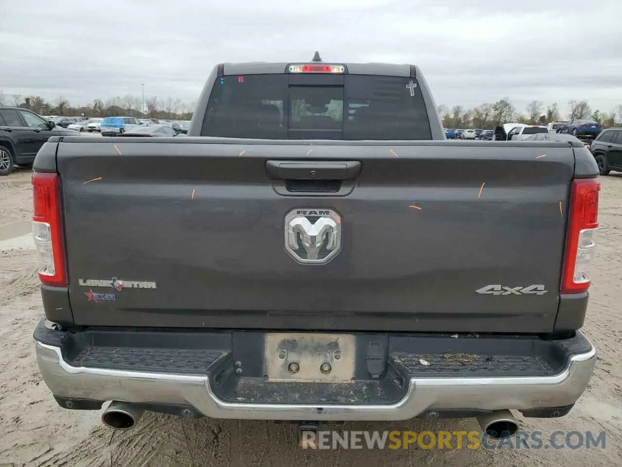 6 Photograph of a damaged car 1C6SRFFT4MN796450 RAM 1500 2021