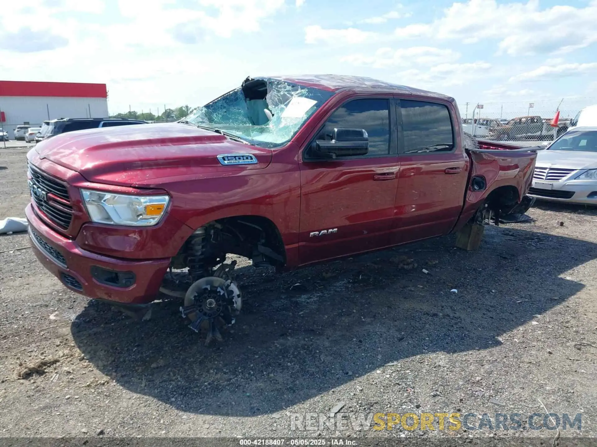 2 Photograph of a damaged car 1C6SRFFT4MN808354 RAM 1500 2021
