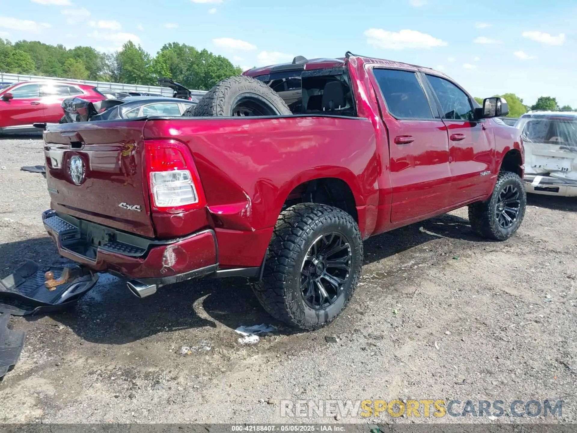 4 Photograph of a damaged car 1C6SRFFT4MN808354 RAM 1500 2021