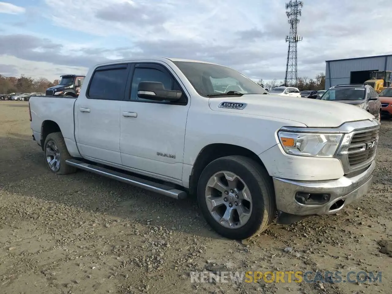 4 Photograph of a damaged car 1C6SRFFT5MN566755 RAM 1500 2021