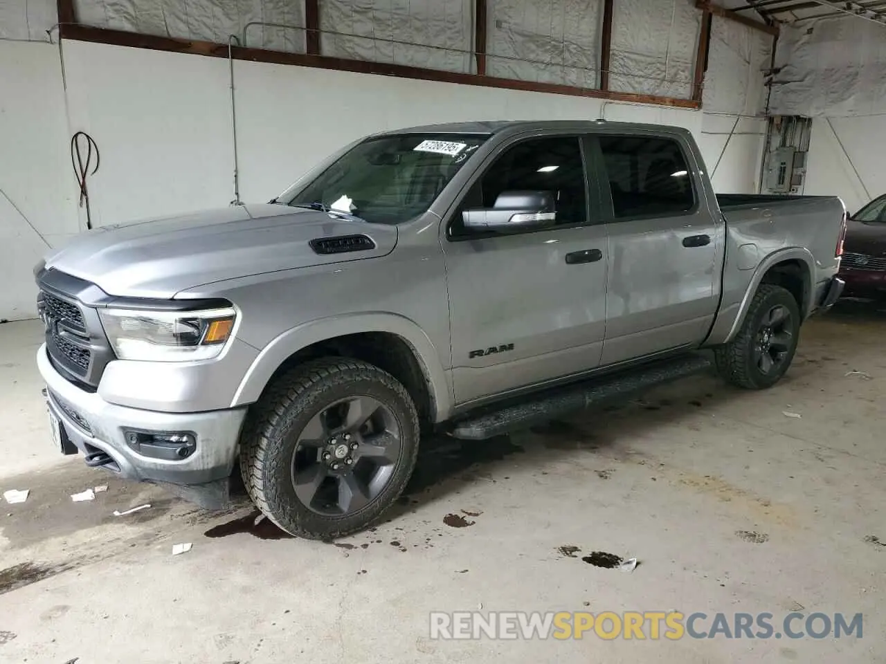 1 Photograph of a damaged car 1C6SRFFT5MN597004 RAM 1500 2021