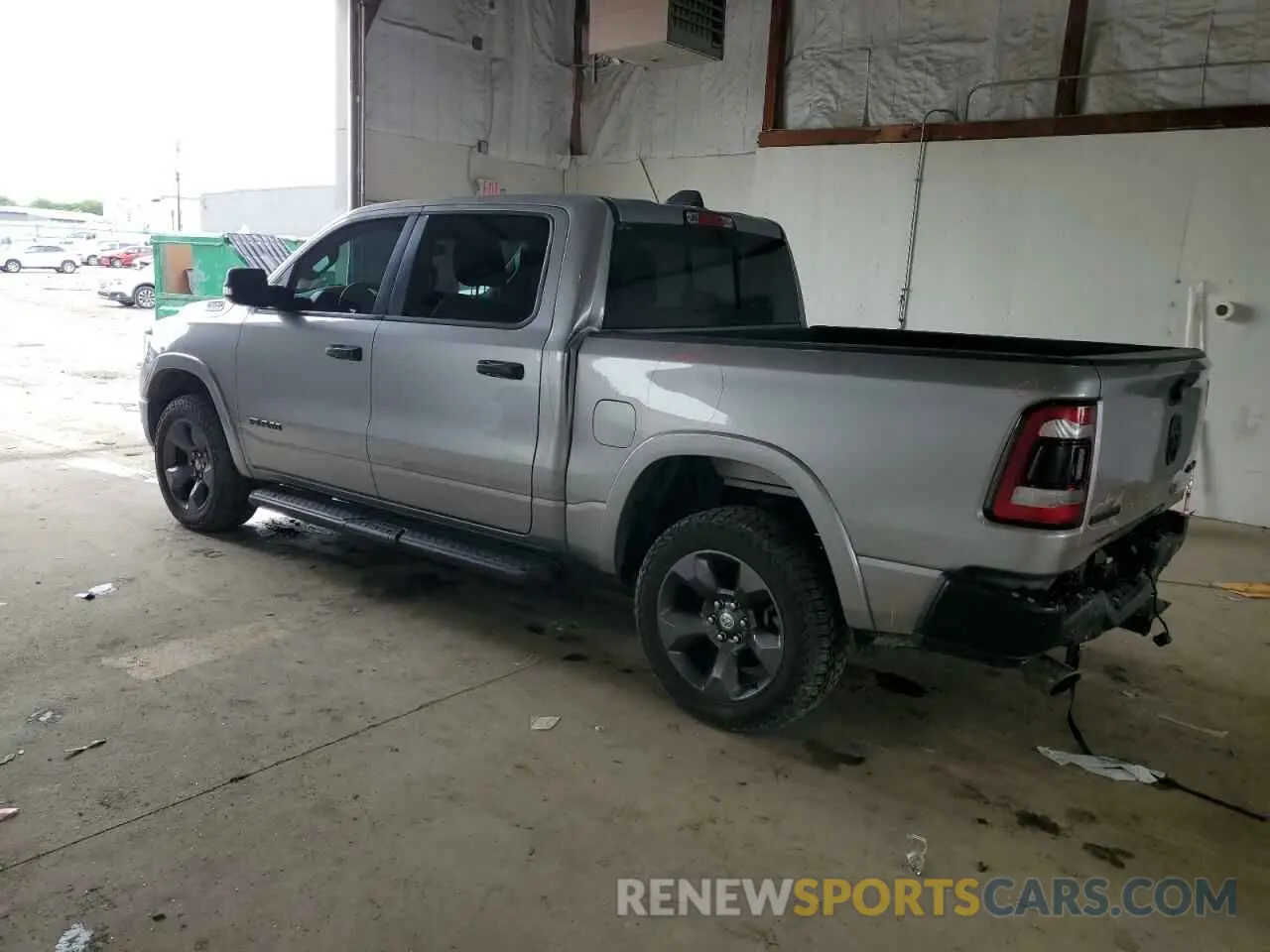 2 Photograph of a damaged car 1C6SRFFT5MN597004 RAM 1500 2021