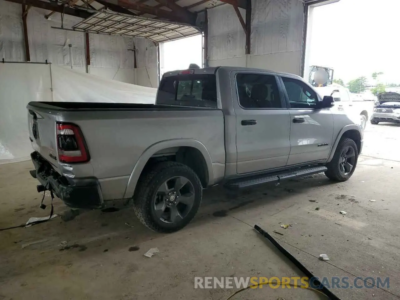 3 Photograph of a damaged car 1C6SRFFT5MN597004 RAM 1500 2021