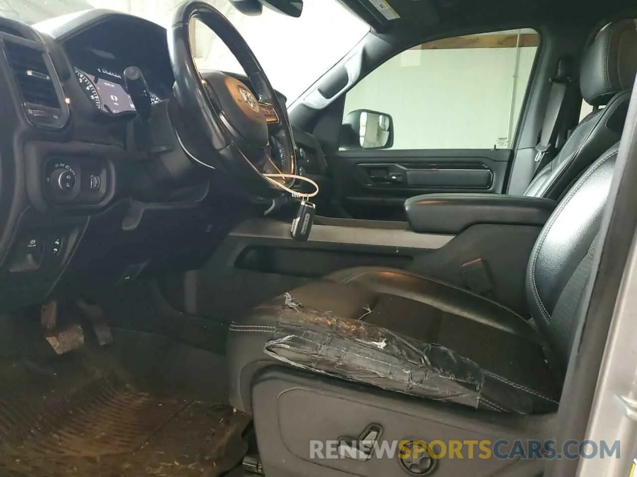 7 Photograph of a damaged car 1C6SRFFT5MN597004 RAM 1500 2021