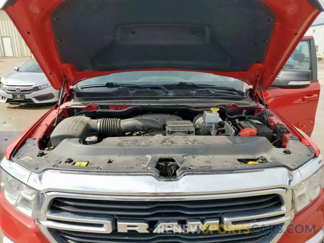 11 Photograph of a damaged car 1C6SRFFT5MN626369 RAM 1500 2021