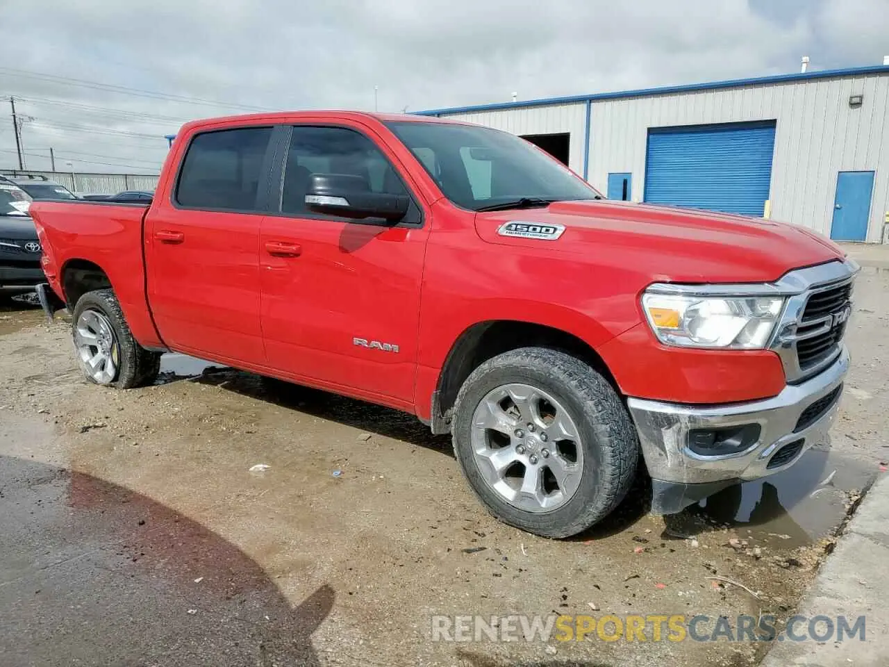 4 Photograph of a damaged car 1C6SRFFT5MN626369 RAM 1500 2021