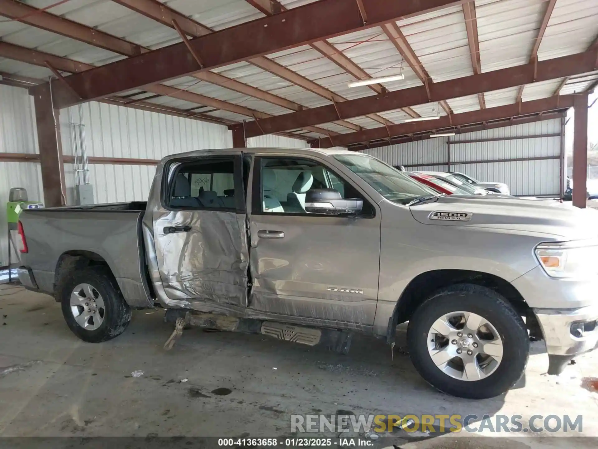 13 Photograph of a damaged car 1C6SRFFT5MN637176 RAM 1500 2021