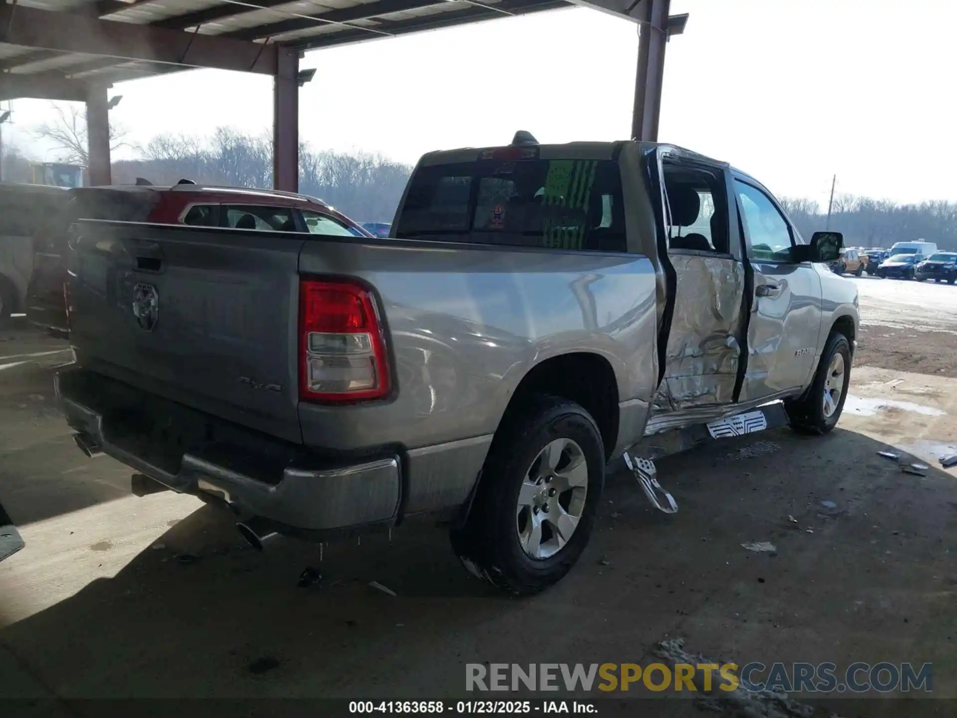 4 Photograph of a damaged car 1C6SRFFT5MN637176 RAM 1500 2021