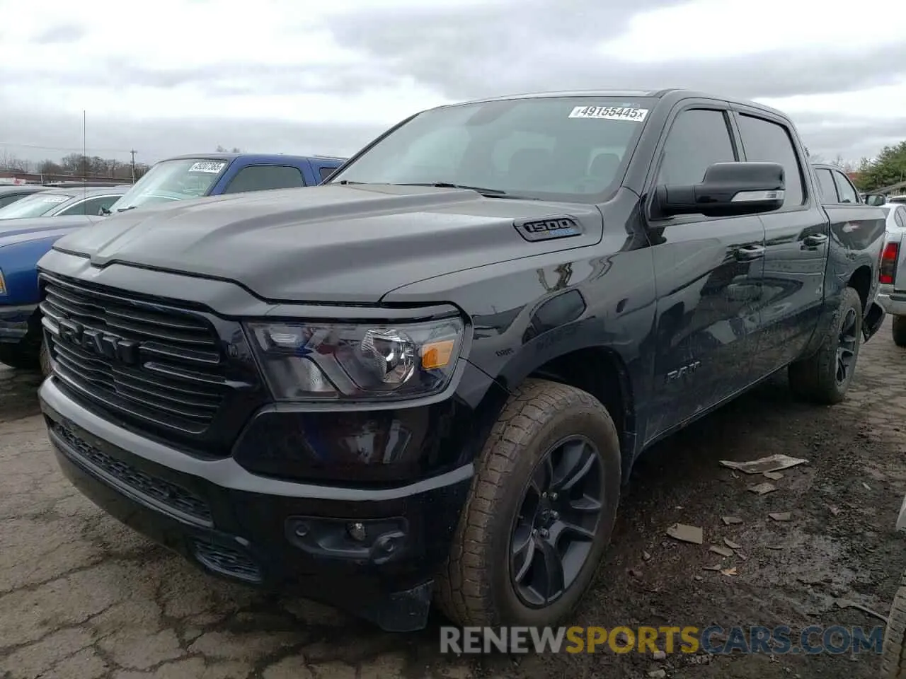 1 Photograph of a damaged car 1C6SRFFT5MN680464 RAM 1500 2021