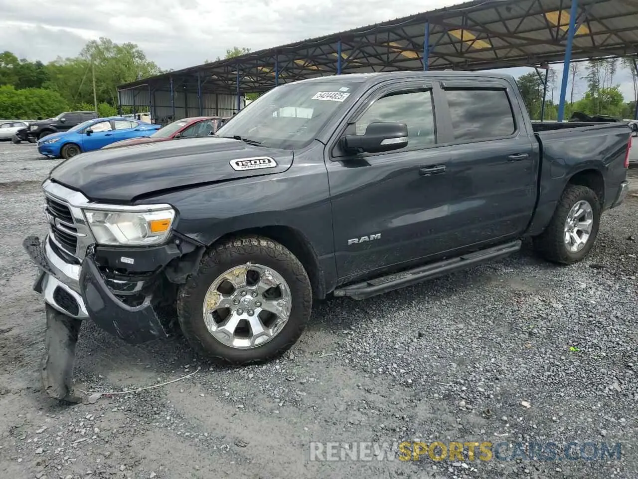 1 Photograph of a damaged car 1C6SRFFT5MN695160 RAM 1500 2021