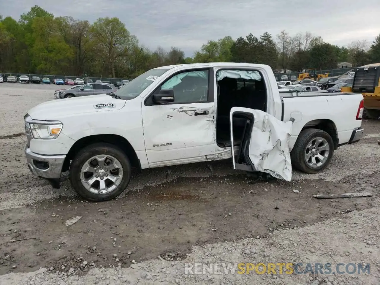1 Photograph of a damaged car 1C6SRFFT5MN827950 RAM 1500 2021