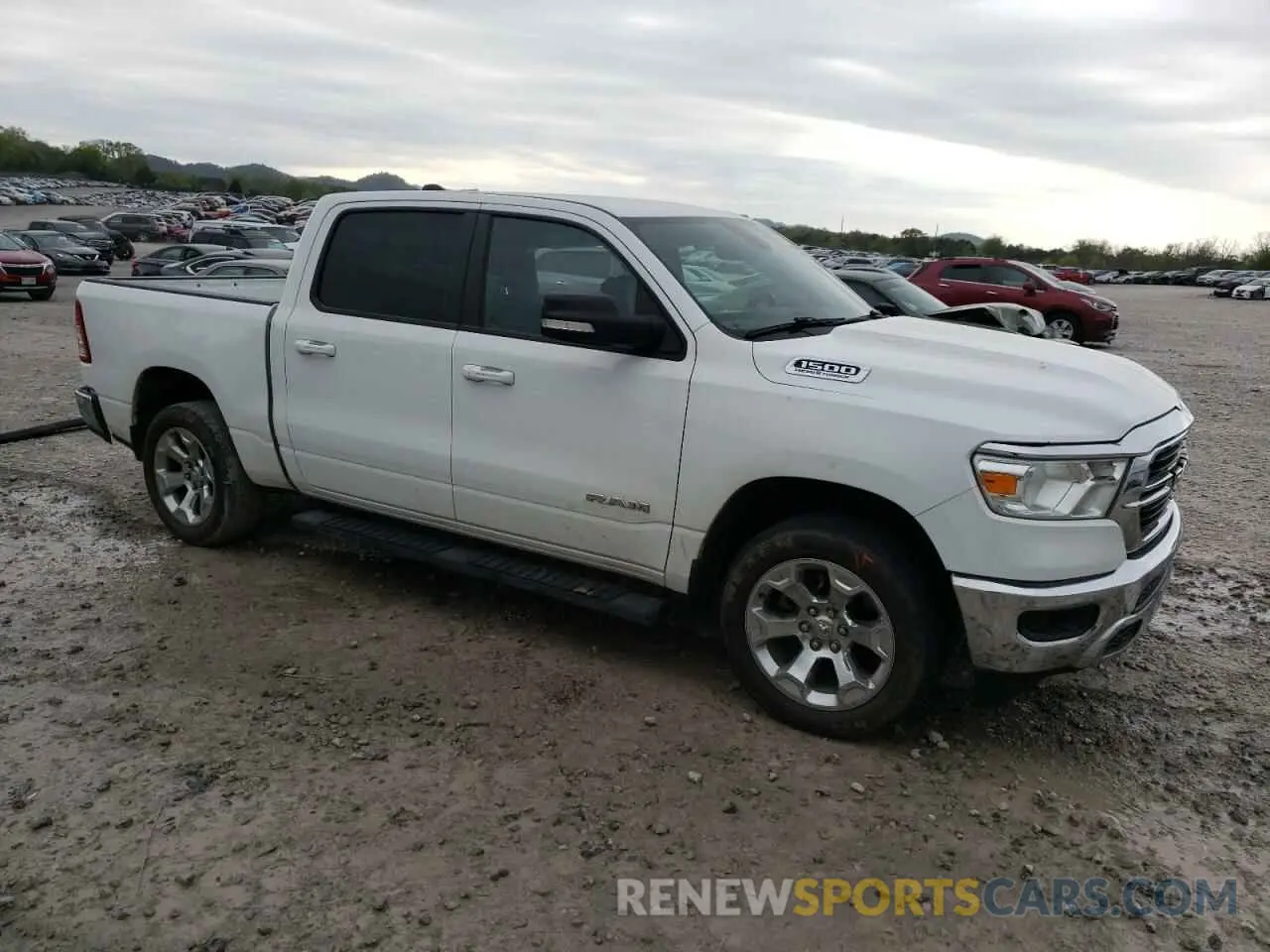 4 Photograph of a damaged car 1C6SRFFT5MN827950 RAM 1500 2021
