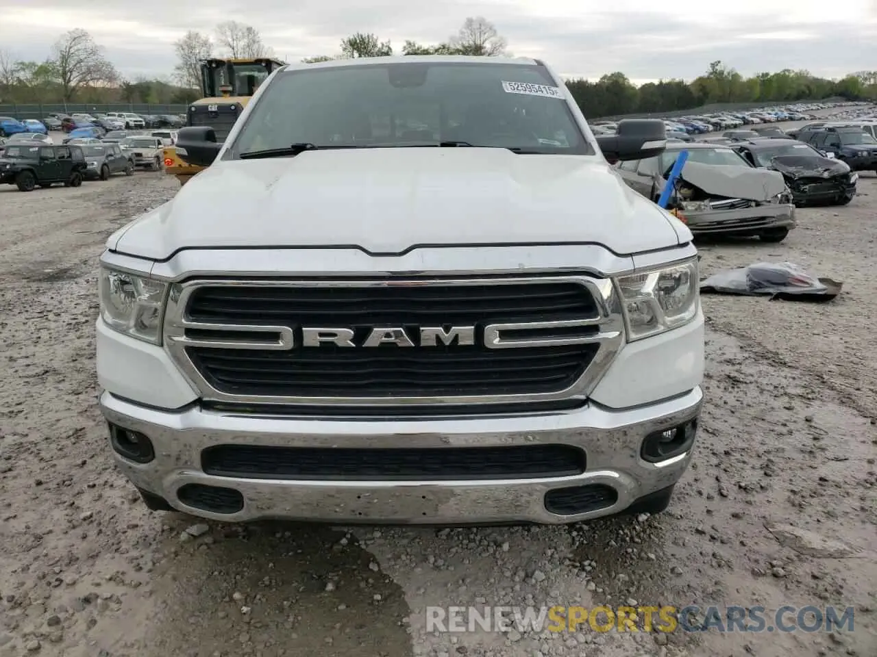5 Photograph of a damaged car 1C6SRFFT5MN827950 RAM 1500 2021