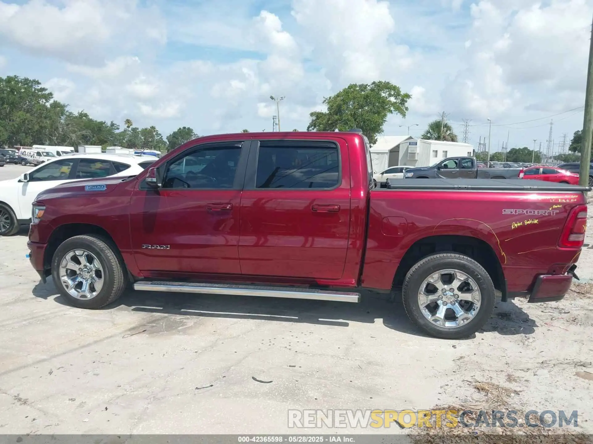 14 Photograph of a damaged car 1C6SRFFT6MN533571 RAM 1500 2021