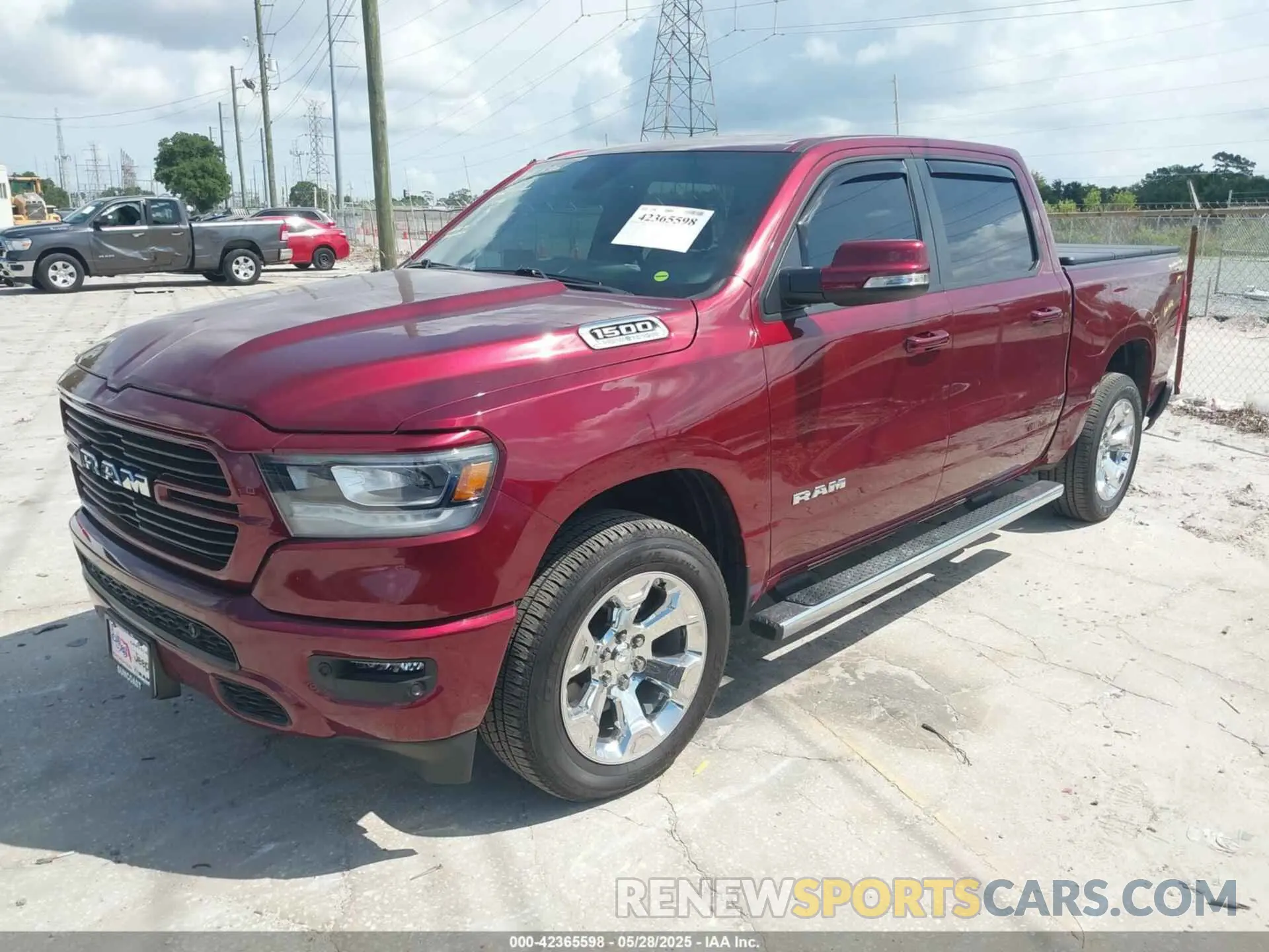2 Photograph of a damaged car 1C6SRFFT6MN533571 RAM 1500 2021