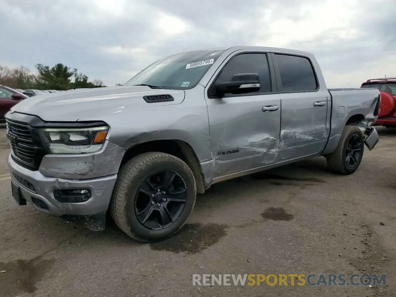 1 Photograph of a damaged car 1C6SRFFT6MN537894 RAM 1500 2021