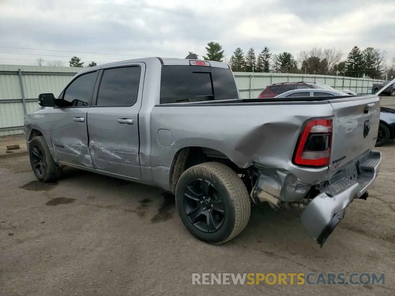 2 Photograph of a damaged car 1C6SRFFT6MN537894 RAM 1500 2021