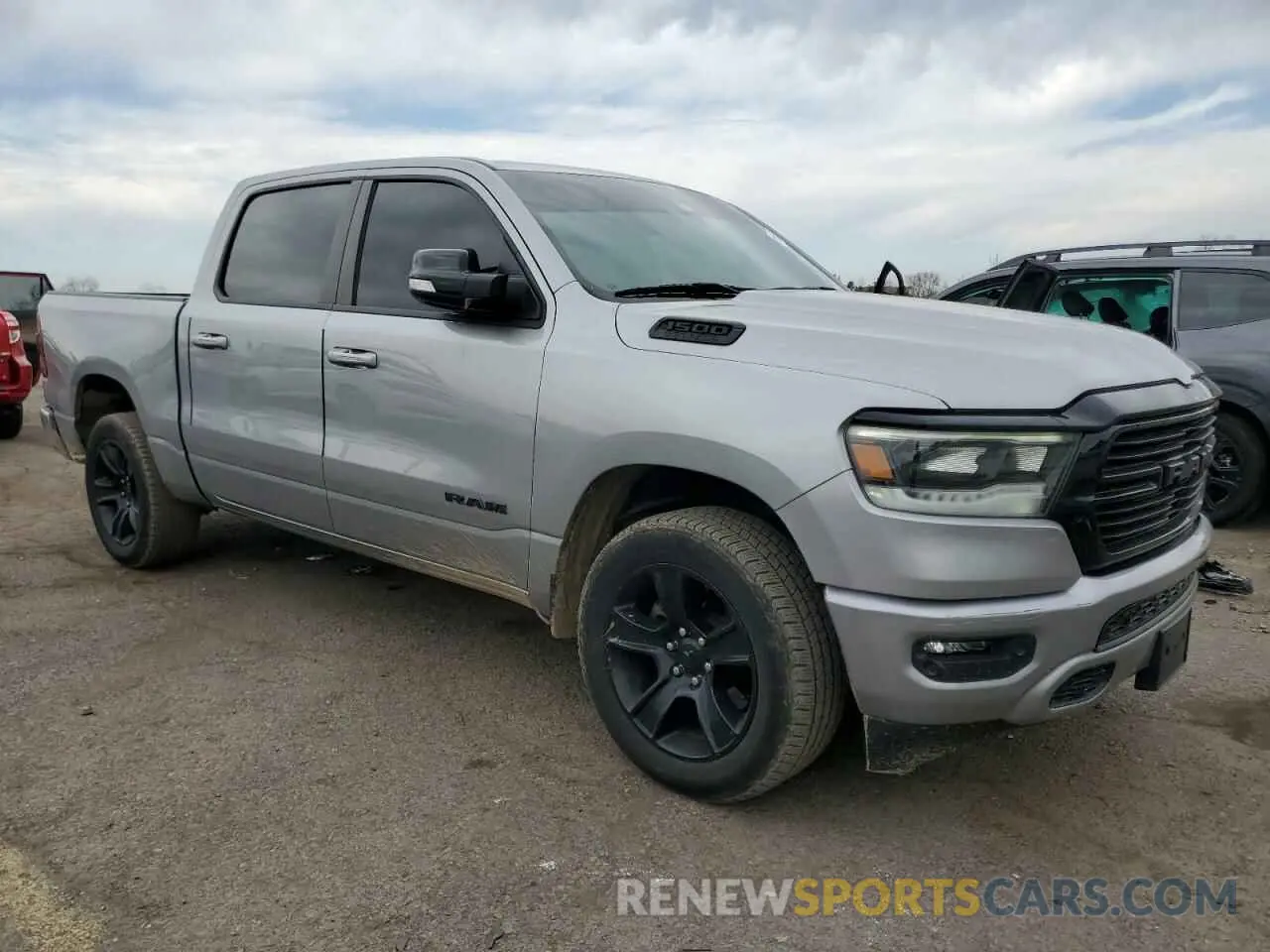 4 Photograph of a damaged car 1C6SRFFT6MN537894 RAM 1500 2021