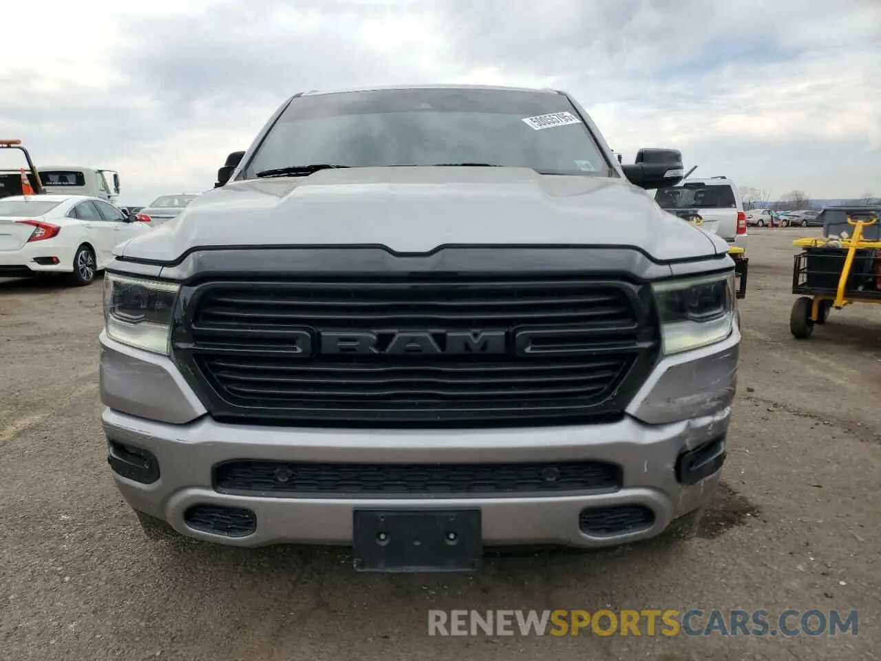 5 Photograph of a damaged car 1C6SRFFT6MN537894 RAM 1500 2021