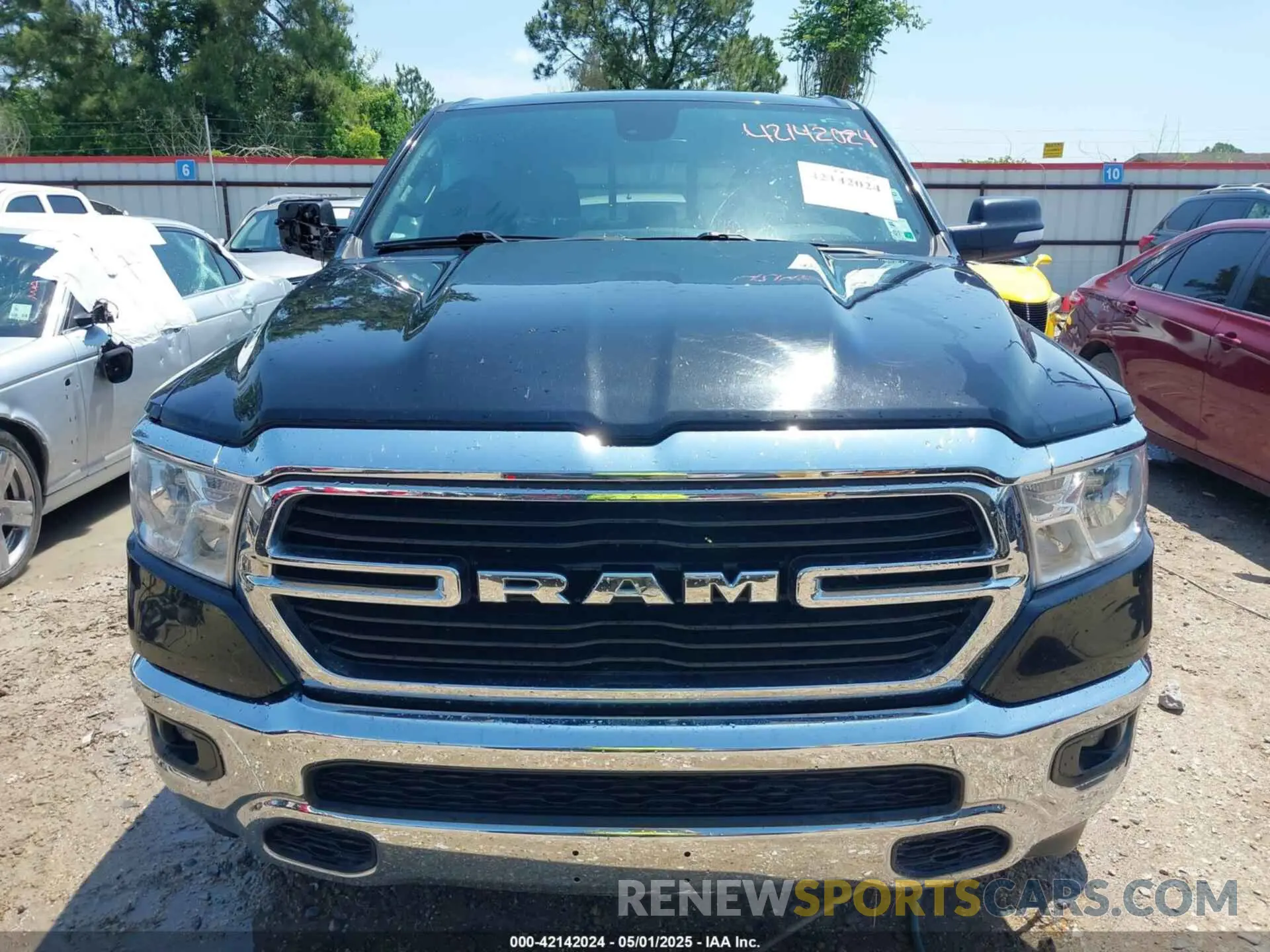 12 Photograph of a damaged car 1C6SRFFT6MN565064 RAM 1500 2021