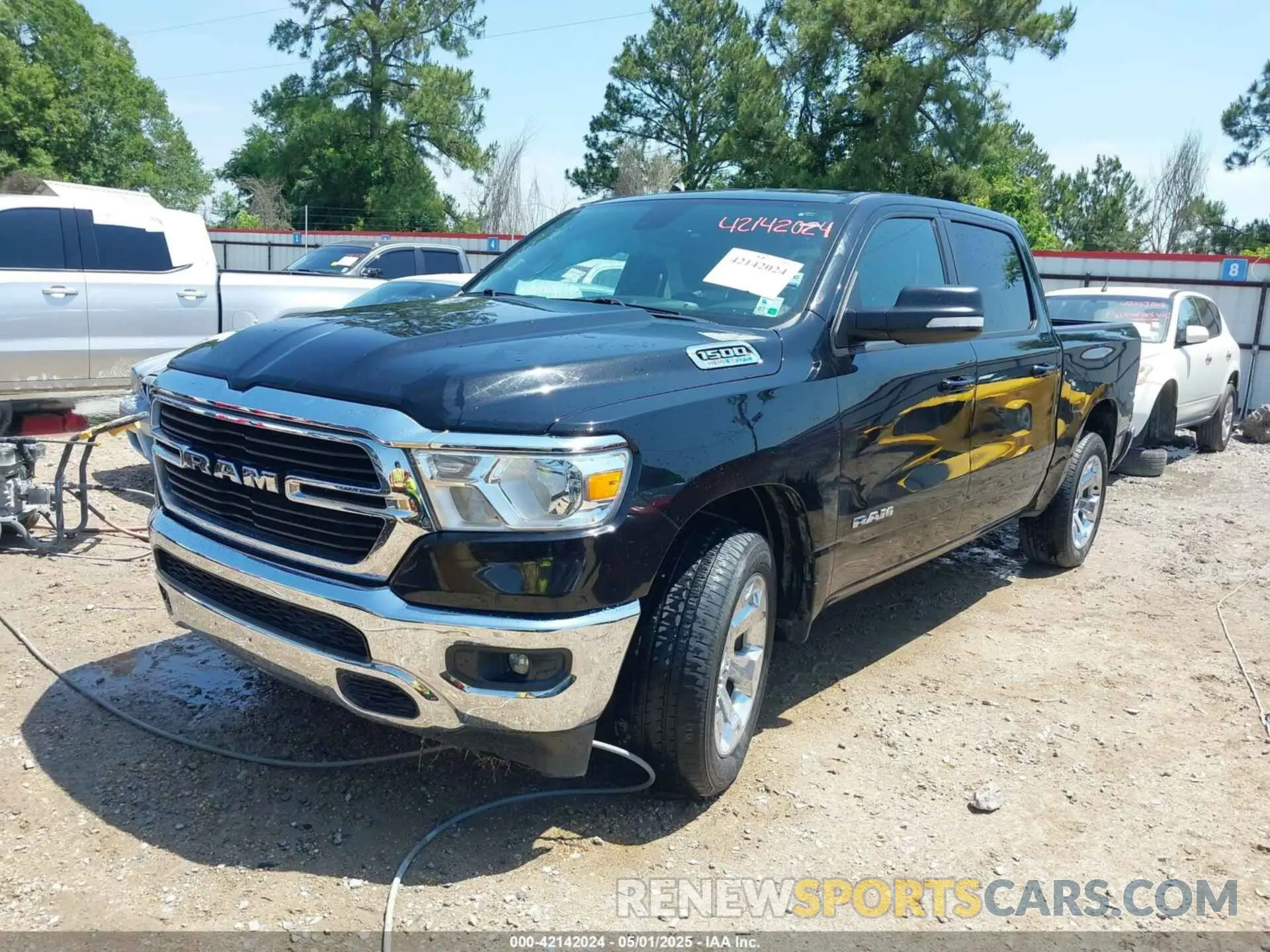 2 Photograph of a damaged car 1C6SRFFT6MN565064 RAM 1500 2021
