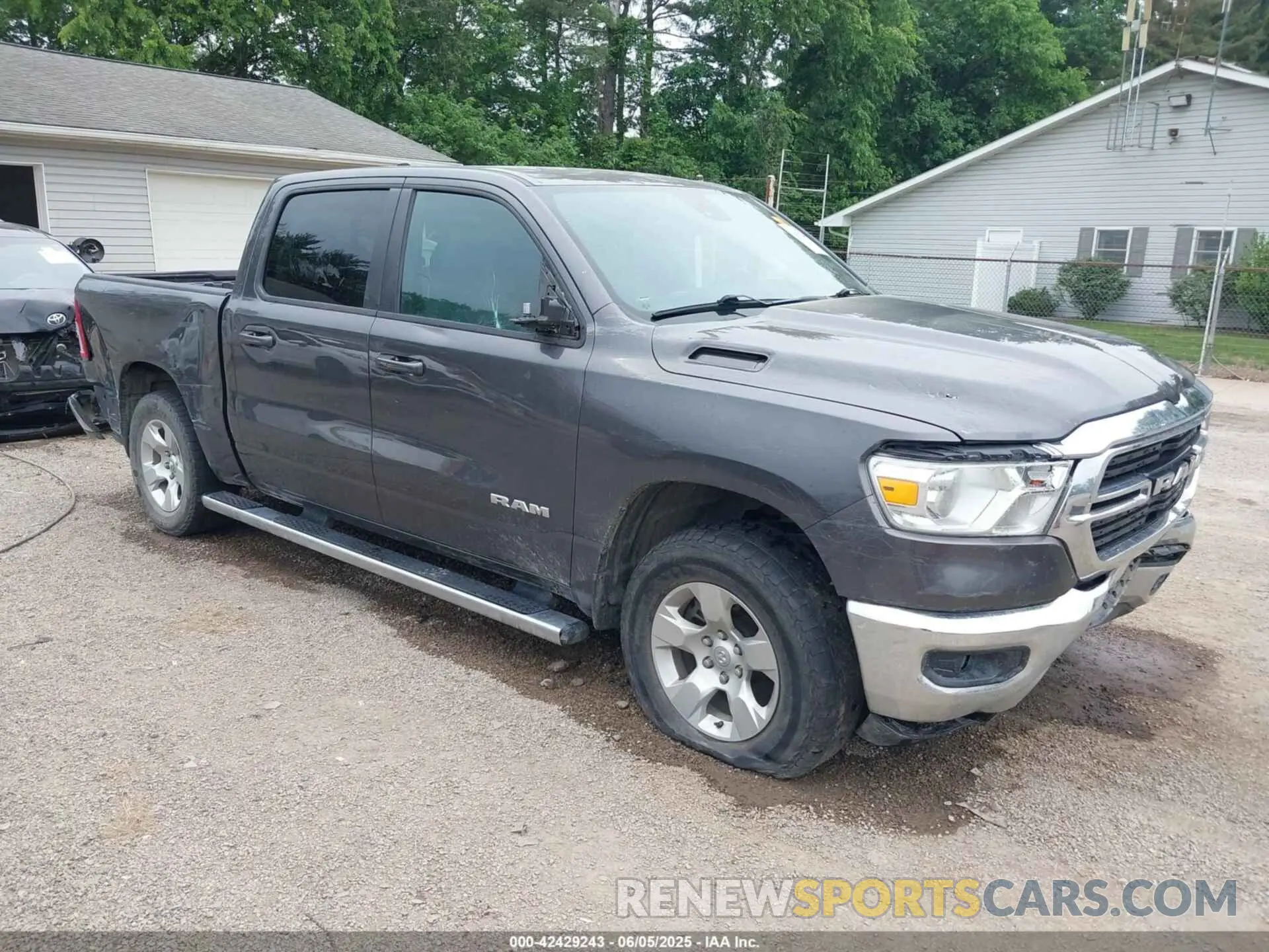 1 Photograph of a damaged car 1C6SRFFT6MN646291 RAM 1500 2021