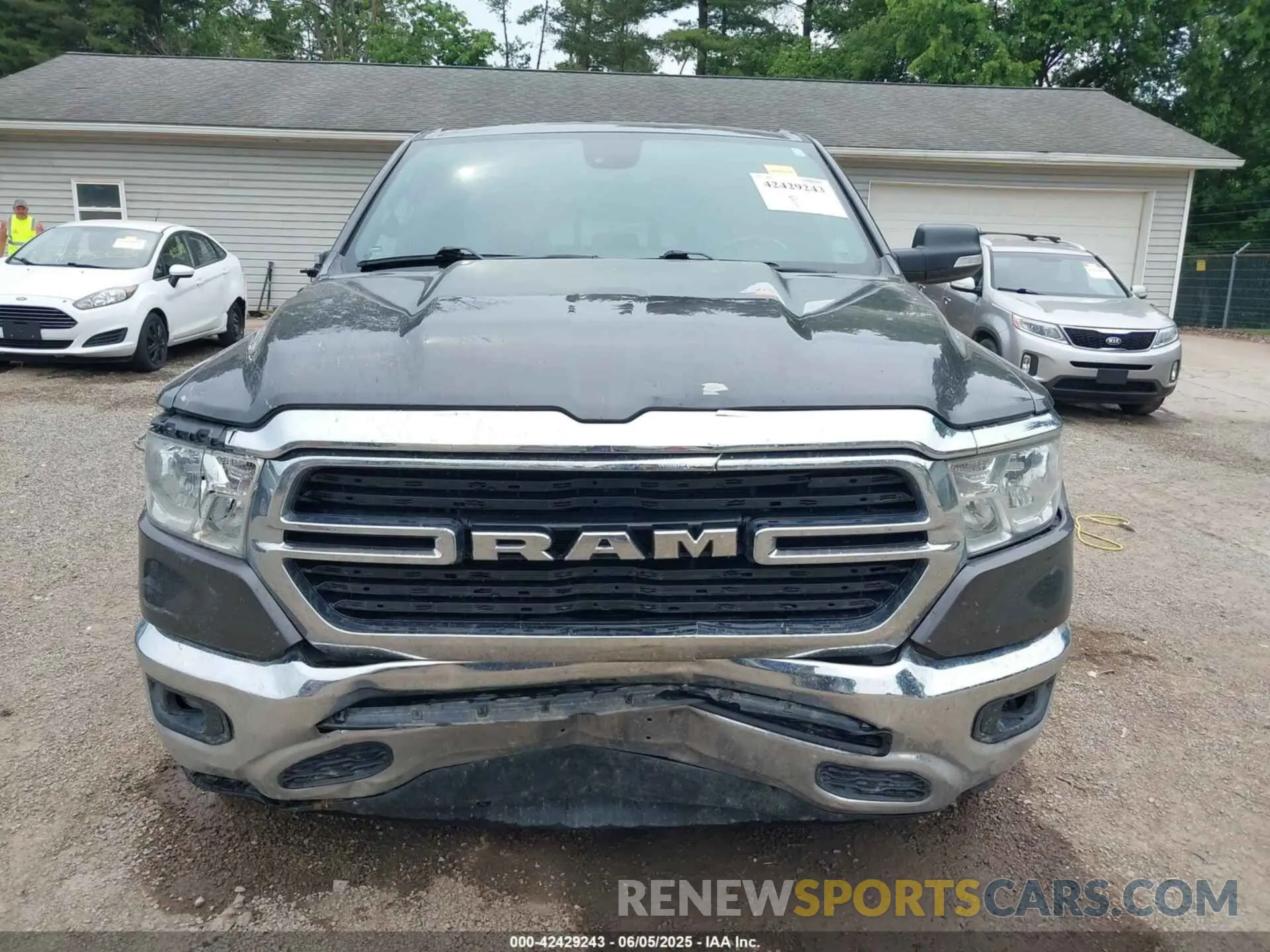 13 Photograph of a damaged car 1C6SRFFT6MN646291 RAM 1500 2021