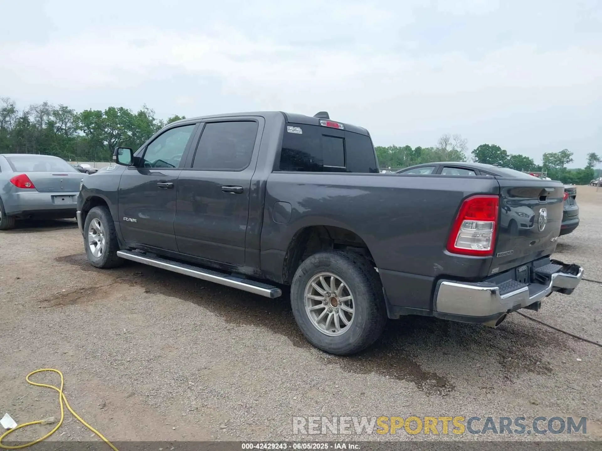 3 Photograph of a damaged car 1C6SRFFT6MN646291 RAM 1500 2021