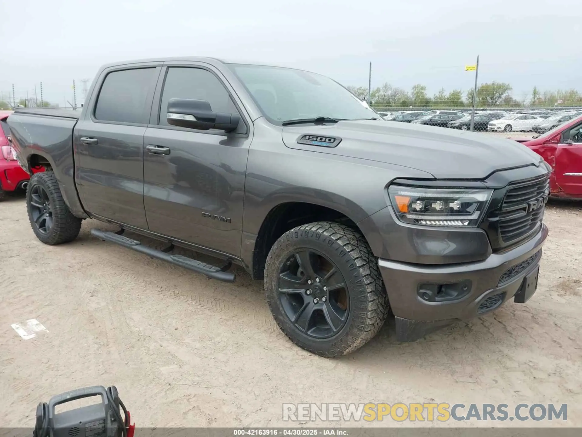 1 Photograph of a damaged car 1C6SRFFT6MN649823 RAM 1500 2021