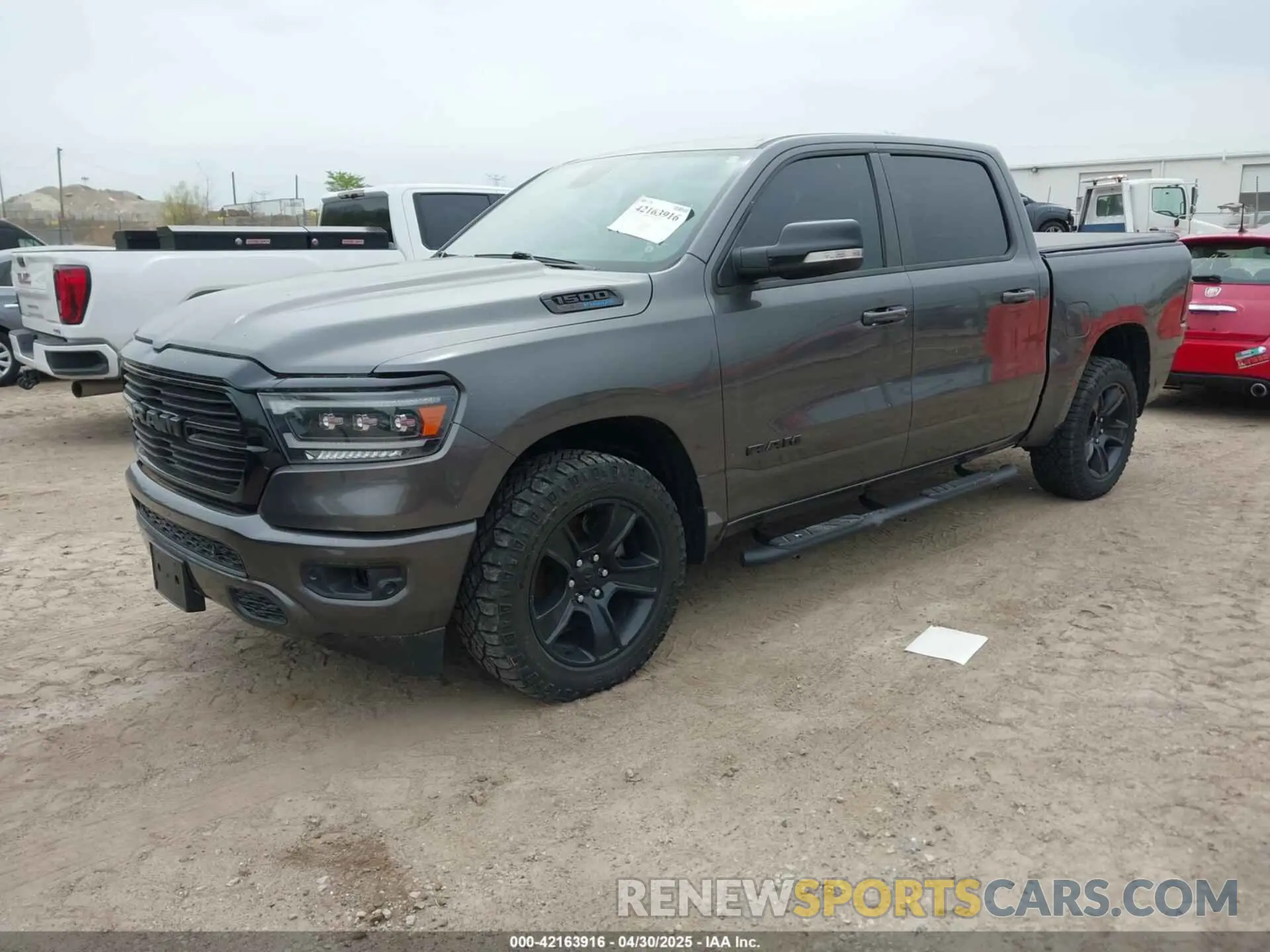 2 Photograph of a damaged car 1C6SRFFT6MN649823 RAM 1500 2021