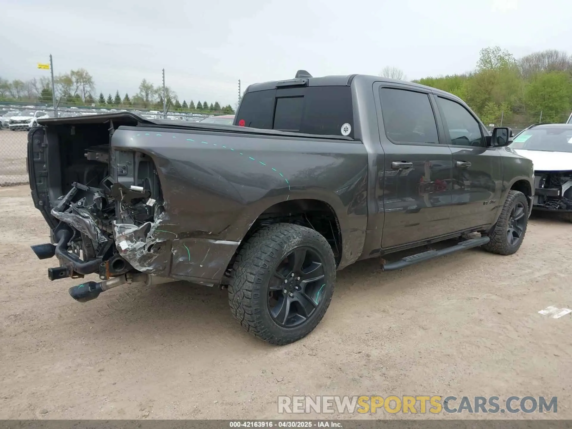 4 Photograph of a damaged car 1C6SRFFT6MN649823 RAM 1500 2021