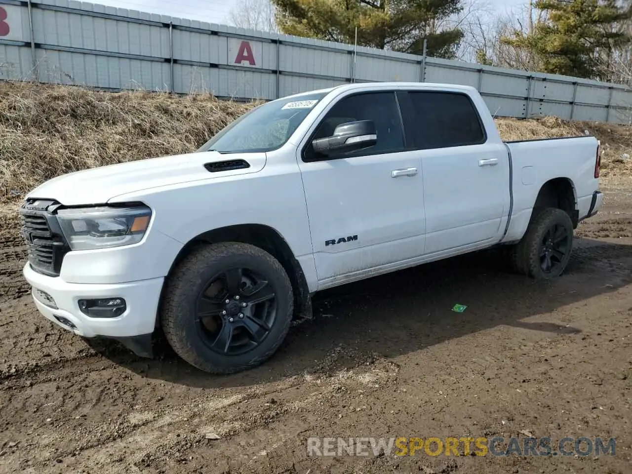 1 Photograph of a damaged car 1C6SRFFT6MN656691 RAM 1500 2021
