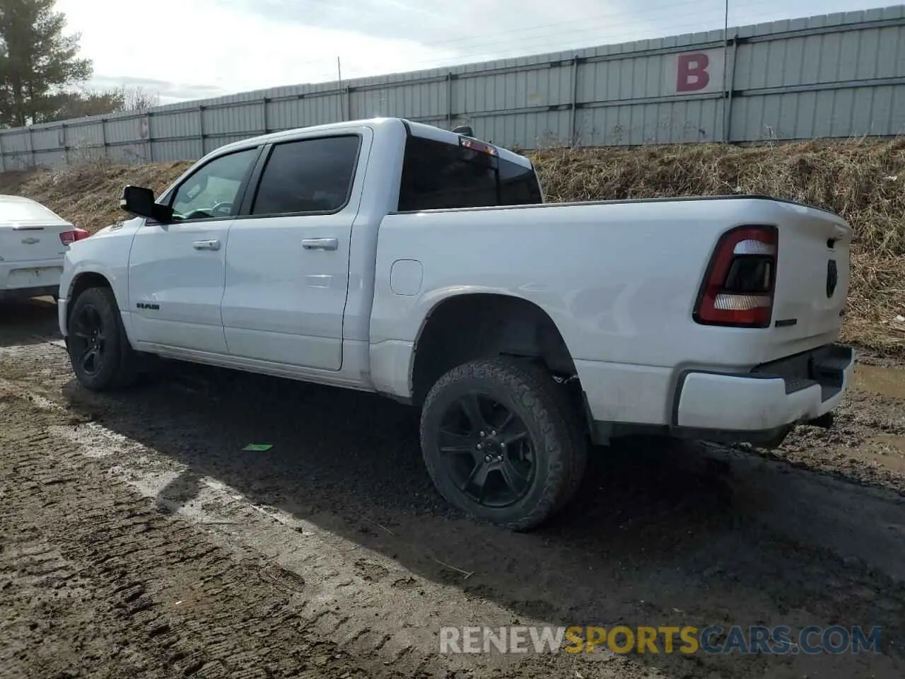 2 Photograph of a damaged car 1C6SRFFT6MN656691 RAM 1500 2021