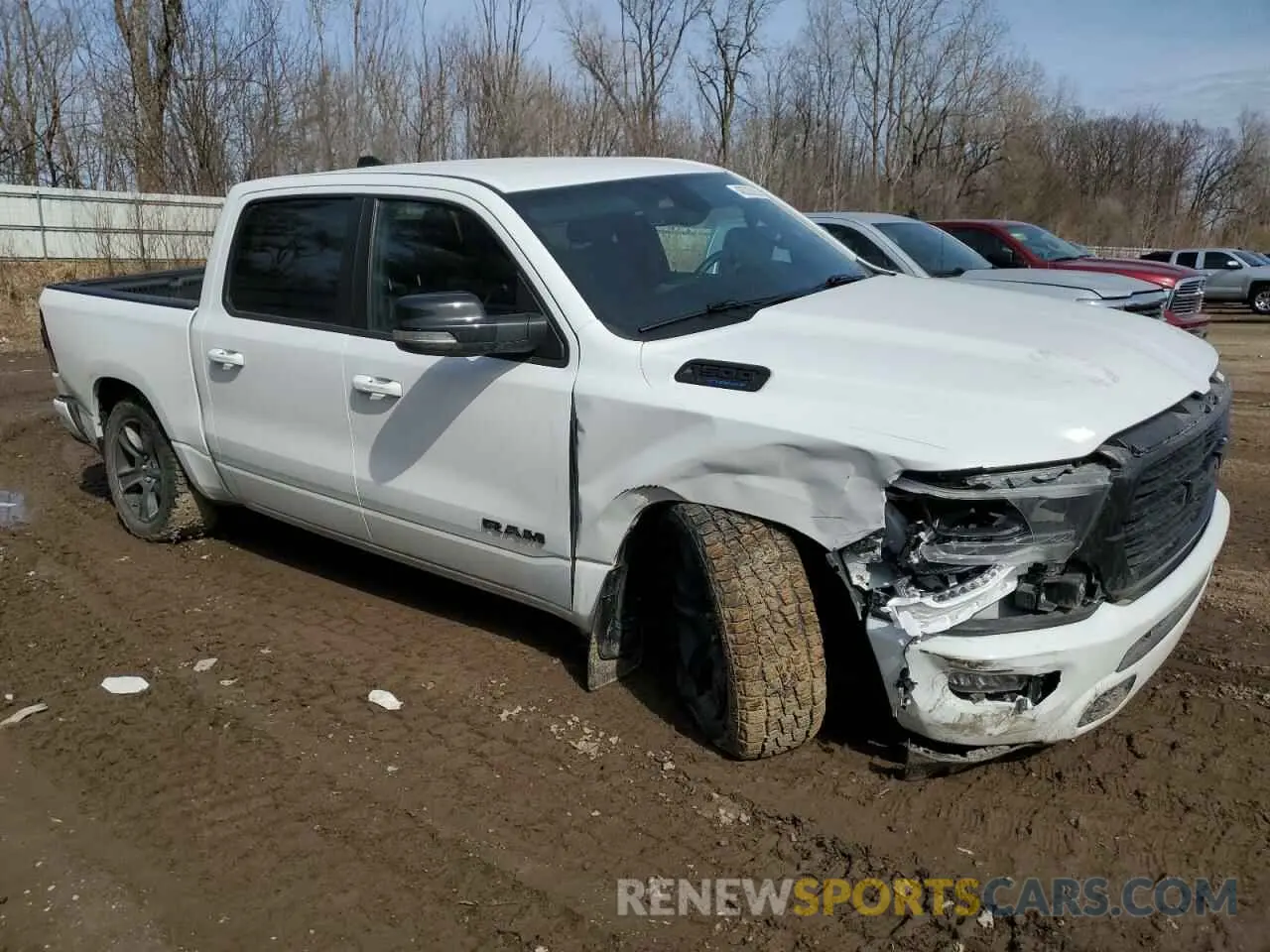 4 Photograph of a damaged car 1C6SRFFT6MN656691 RAM 1500 2021