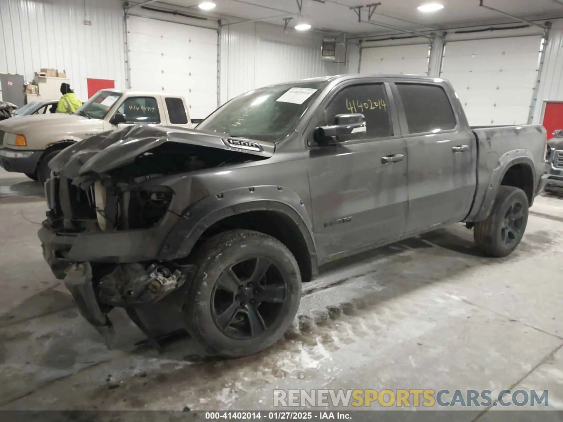 2 Photograph of a damaged car 1C6SRFFT6MN675158 RAM 1500 2021