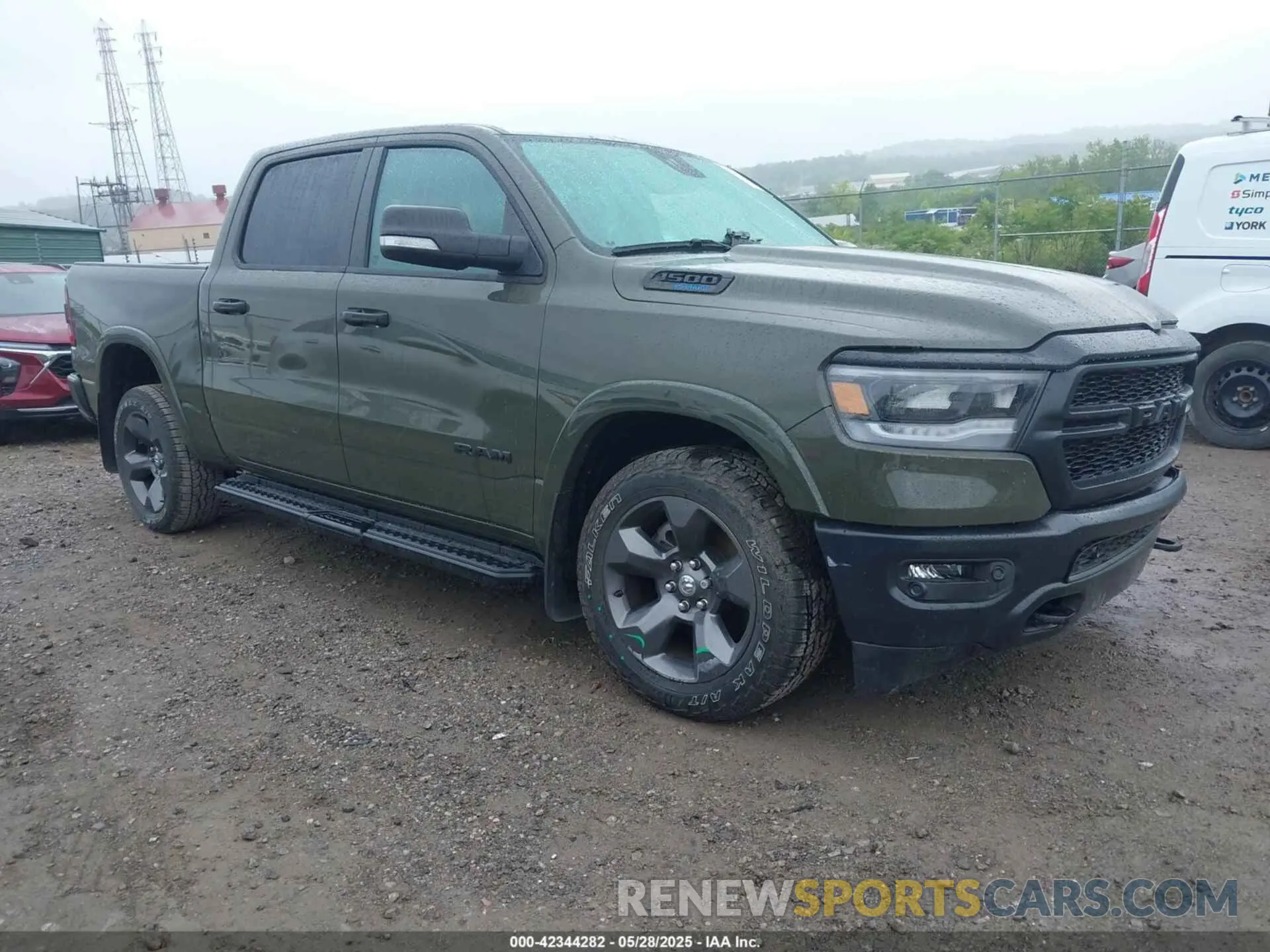 1 Photograph of a damaged car 1C6SRFFT6MN695393 RAM 1500 2021