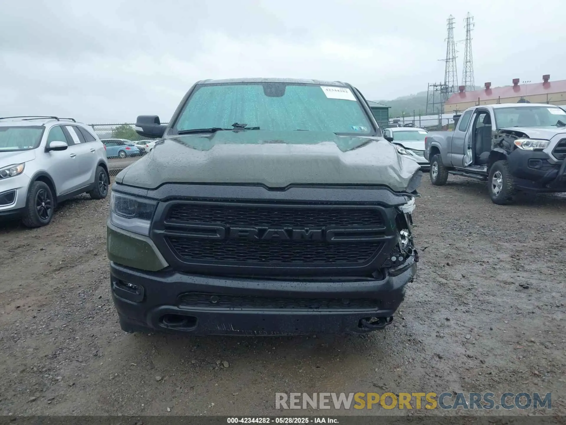13 Photograph of a damaged car 1C6SRFFT6MN695393 RAM 1500 2021
