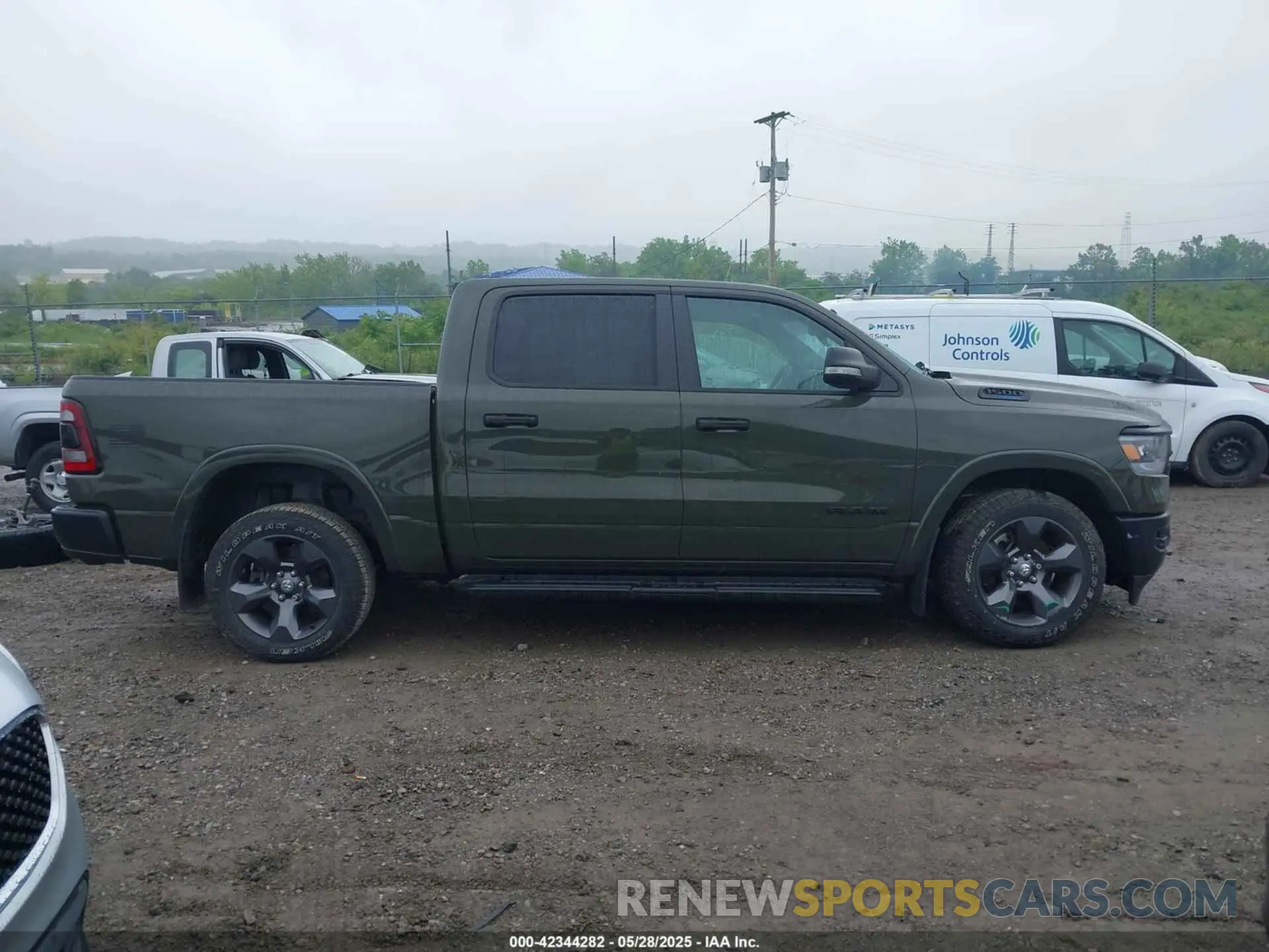 14 Photograph of a damaged car 1C6SRFFT6MN695393 RAM 1500 2021