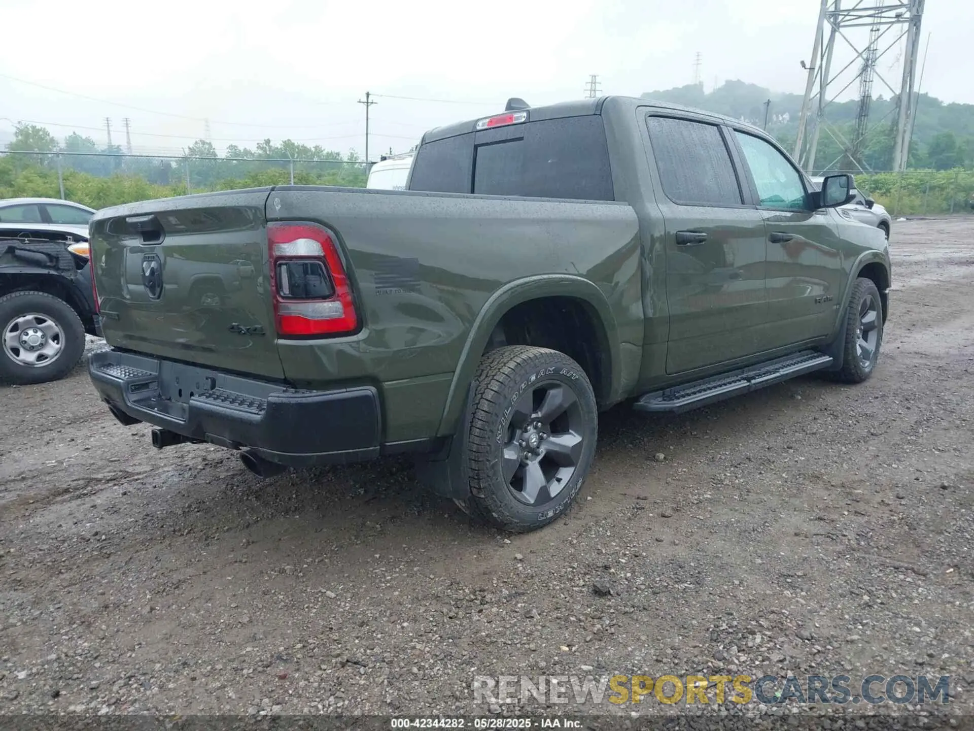 4 Photograph of a damaged car 1C6SRFFT6MN695393 RAM 1500 2021