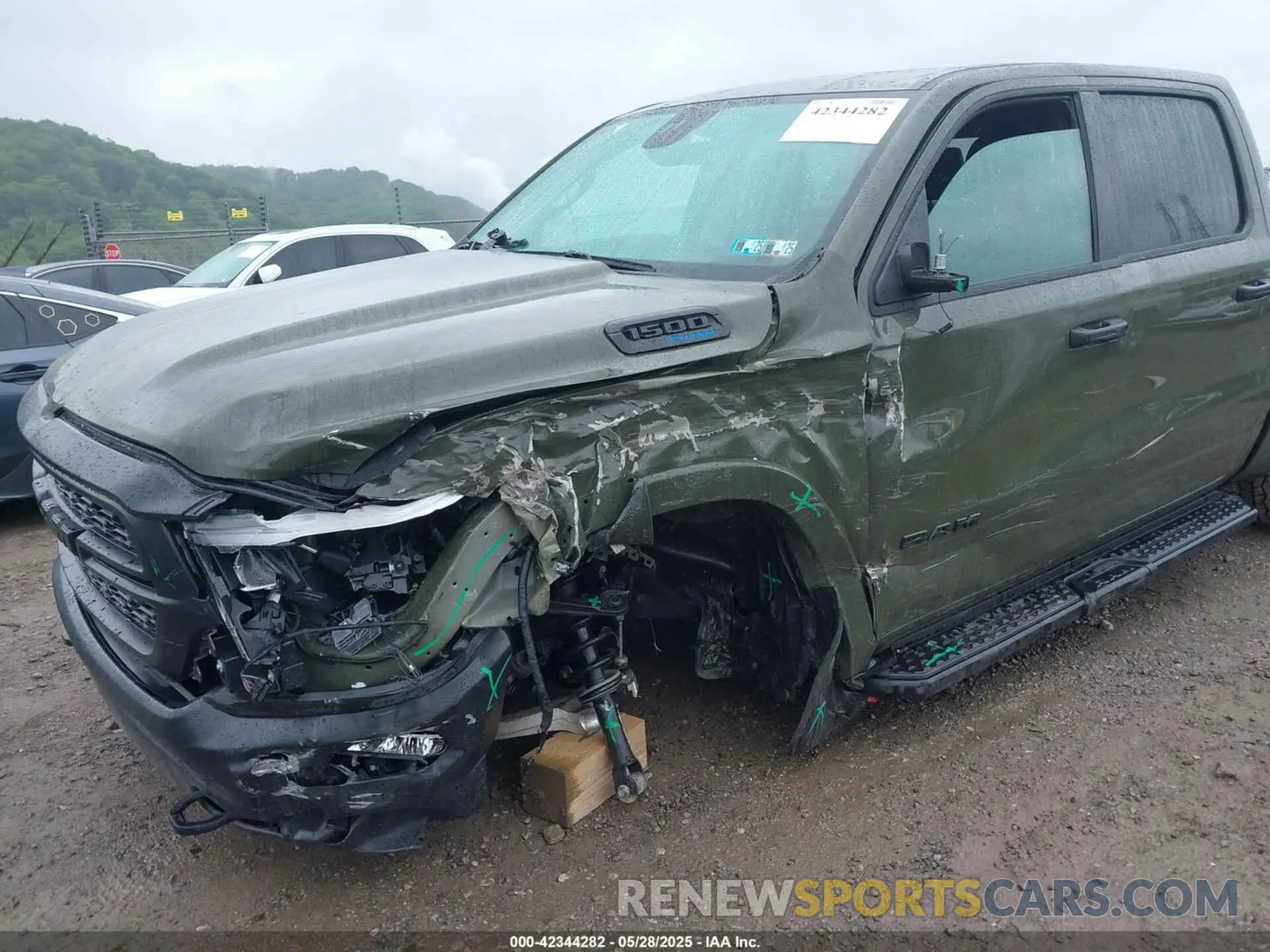 6 Photograph of a damaged car 1C6SRFFT6MN695393 RAM 1500 2021