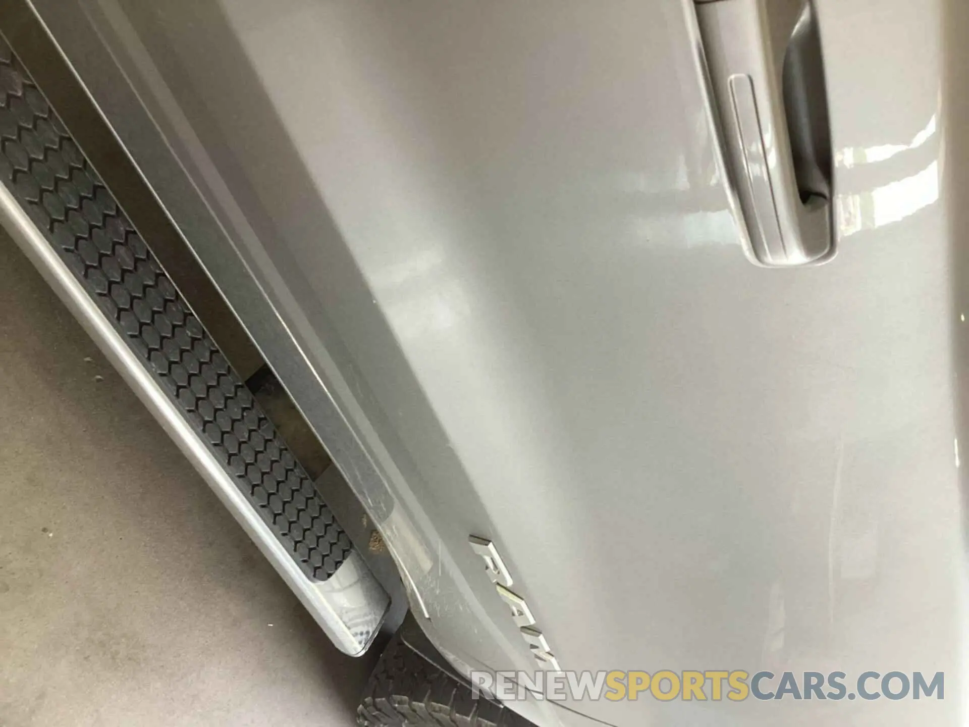 1 Photograph of a damaged car 1C6SRFFT6MN714623 RAM 1500 2021