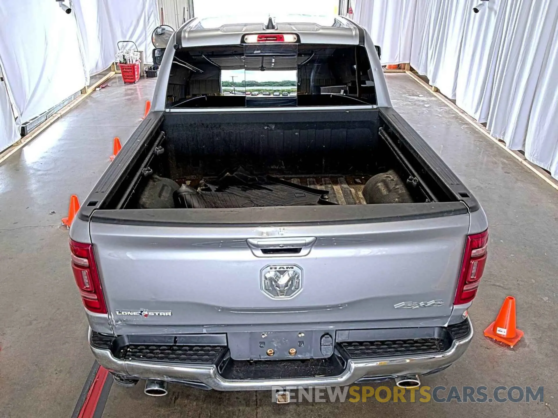 12 Photograph of a damaged car 1C6SRFFT6MN714623 RAM 1500 2021