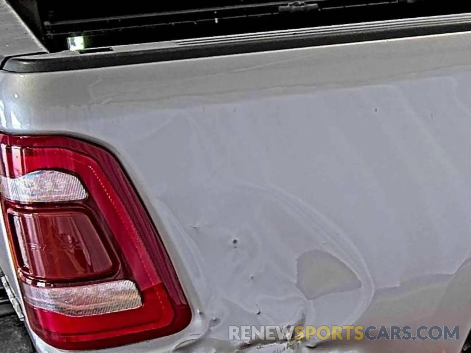 23 Photograph of a damaged car 1C6SRFFT6MN714623 RAM 1500 2021