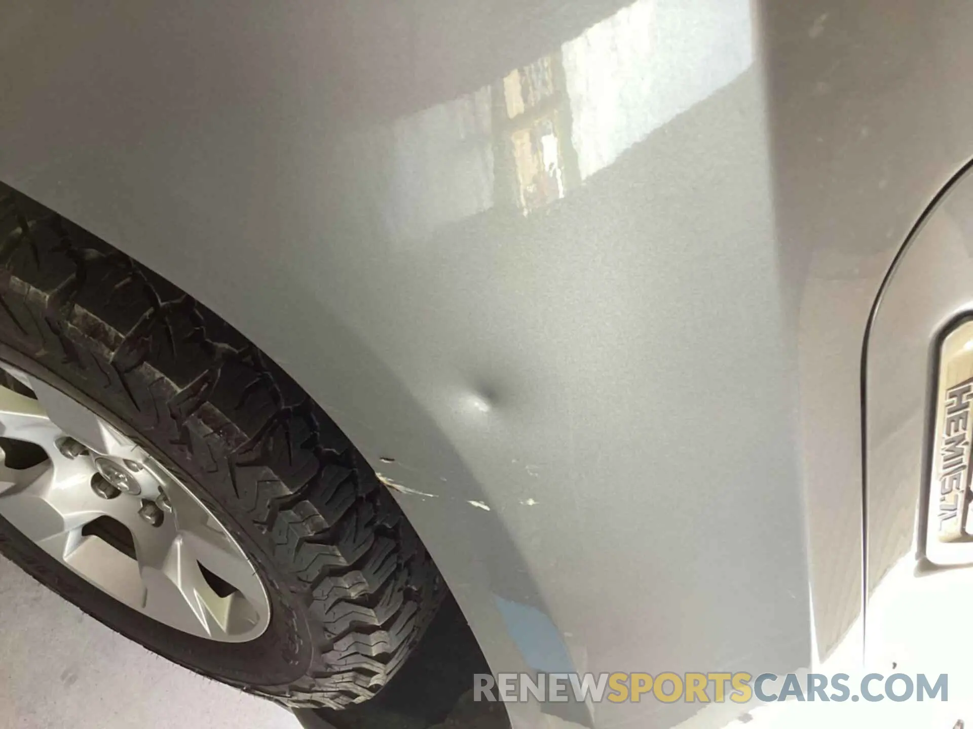 26 Photograph of a damaged car 1C6SRFFT6MN714623 RAM 1500 2021