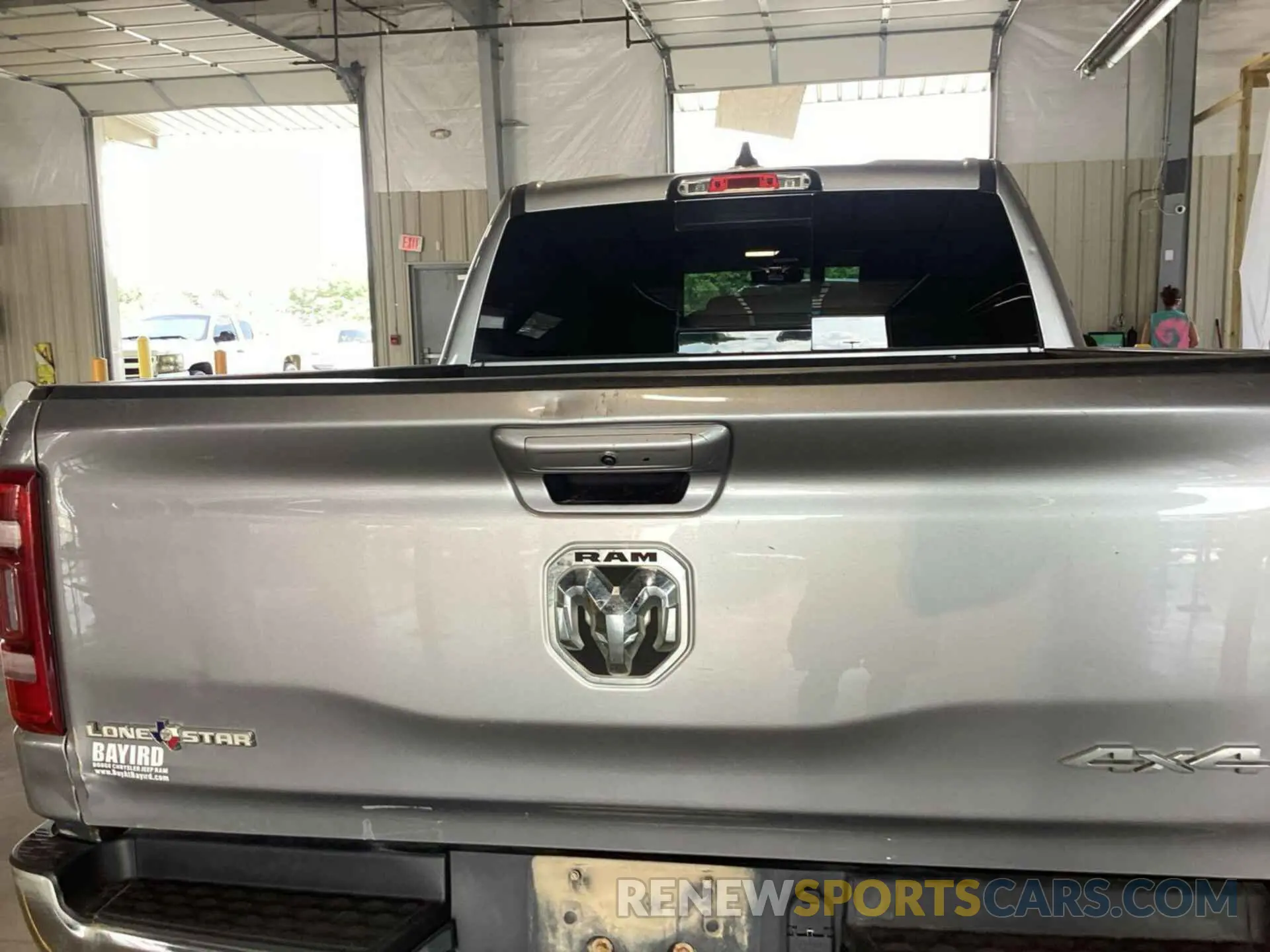 28 Photograph of a damaged car 1C6SRFFT6MN714623 RAM 1500 2021