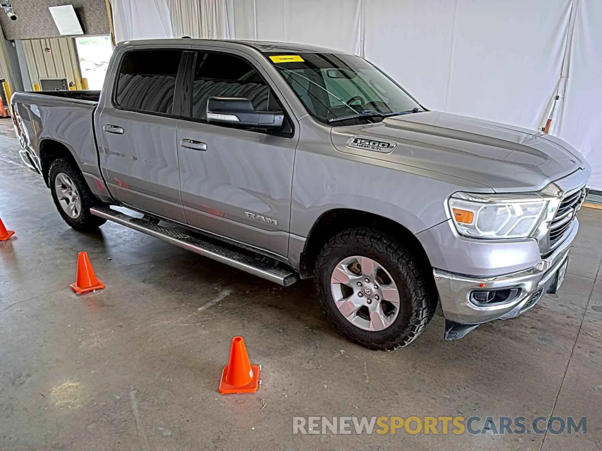 33 Photograph of a damaged car 1C6SRFFT6MN714623 RAM 1500 2021