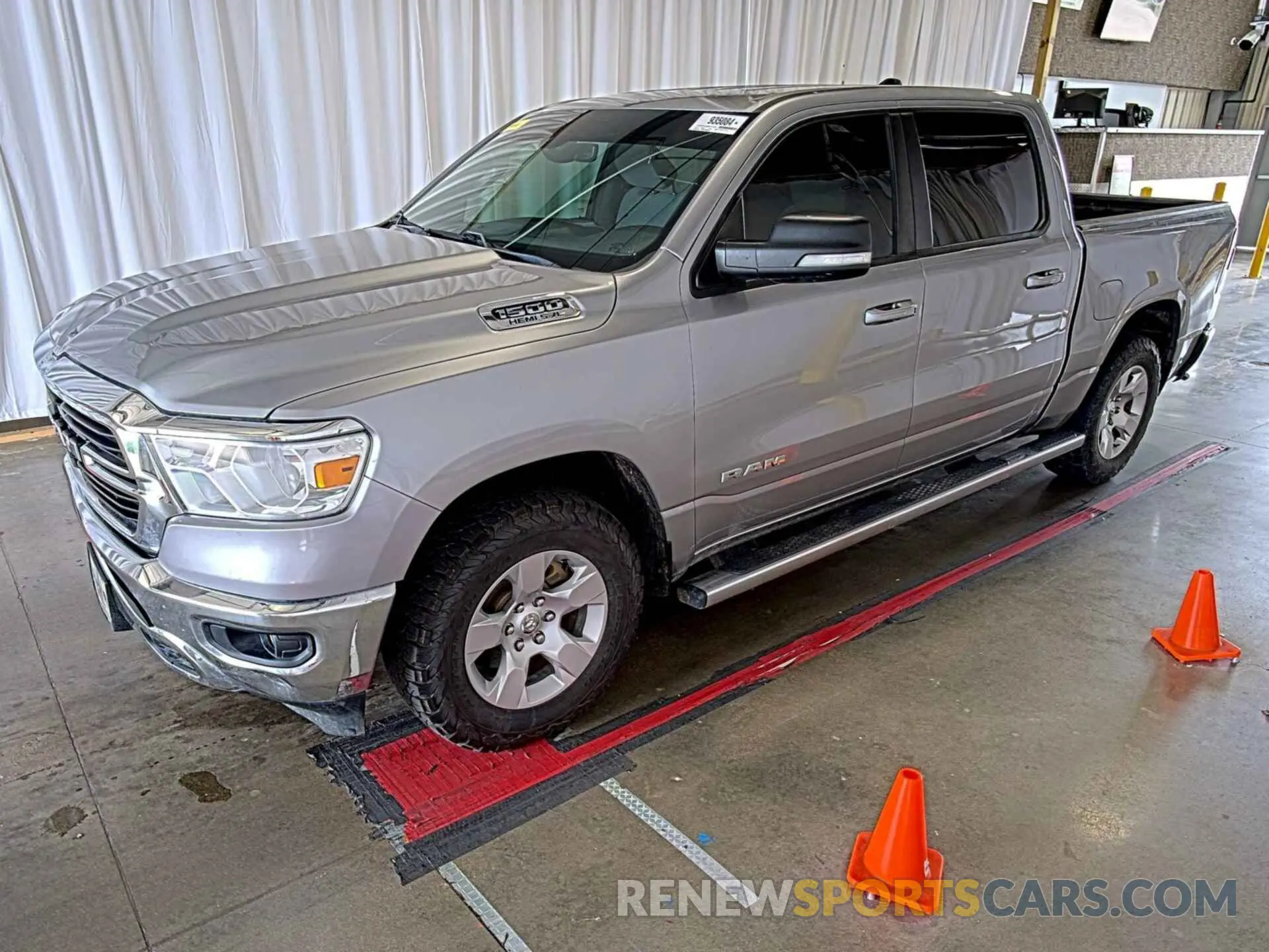35 Photograph of a damaged car 1C6SRFFT6MN714623 RAM 1500 2021