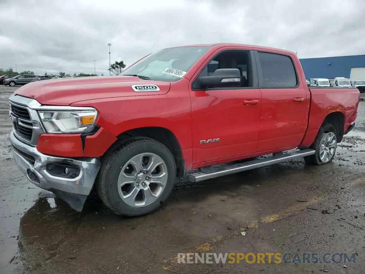 1 Photograph of a damaged car 1C6SRFFT6MN734466 RAM 1500 2021