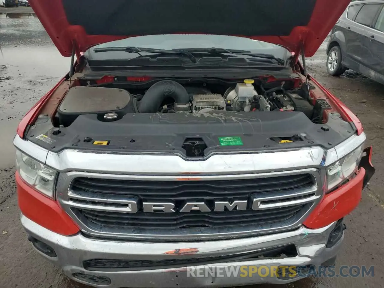11 Photograph of a damaged car 1C6SRFFT6MN734466 RAM 1500 2021