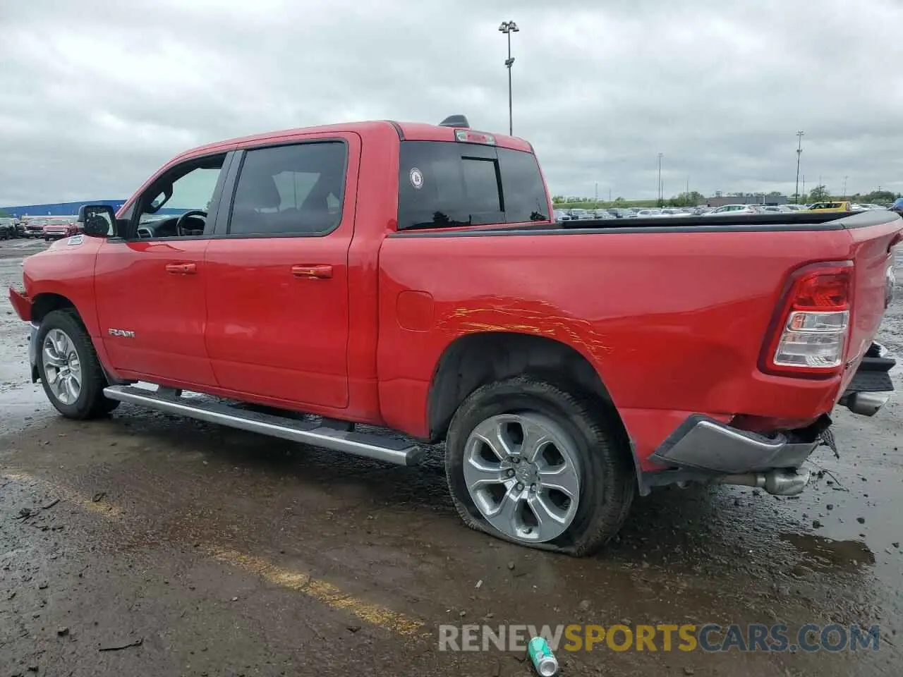 2 Photograph of a damaged car 1C6SRFFT6MN734466 RAM 1500 2021